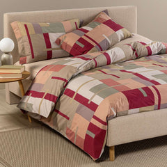 Copripiumino Caleffi Lennox in cotone, fantasia geometrica corallo bordeaux. Per letto piazza e mezza e matrimoniale.