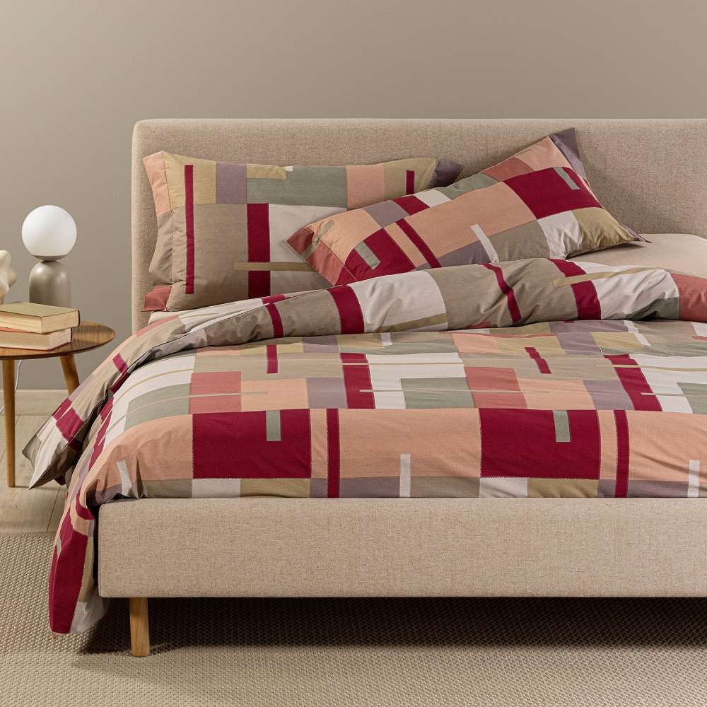 Copripiumino Caleffi Lennox in cotone, fantasia geometrica a riquadri corallo bordeaux