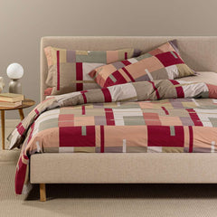 Copripiumino Caleffi Lennox in cotone, fantasia geometrica a riquadri corallo bordeaux