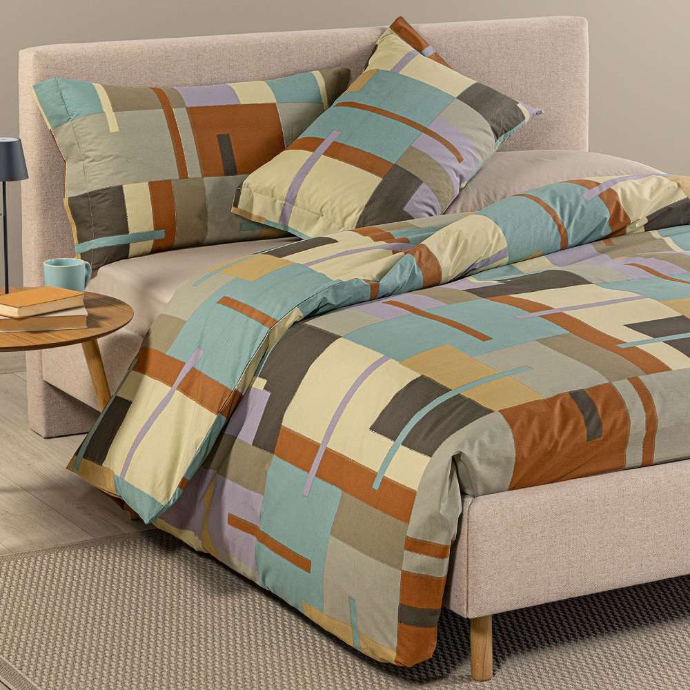 Copripiumino Caleffi Lennox in cotone, fantasia geometrica a riquadri multicolor. Per letto piazza e mezza e matrimoniale.