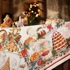 Tovaglia natalizia Noel Gourmand in puro lino di Tessitura Toscana Telerie. Fantasia su fondo chiaro, con scene che ritraggono dolci natalizi e tavole imbandite nel periodo di Natale. Le scene ritratte sono ricche di dettagli e fanno respirare aria di festa. La fantasia è incorniciata da una riga rossa e da una ghirlanda di biscotti a tema natalizio. Misura rettangolare x12 (170x270 cm). Dettaglio fantasia
