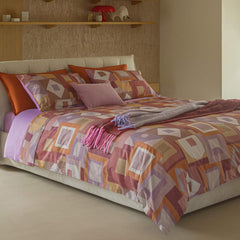 Trapunta Invernale Fazzini Opale piumone matrimoniale fantasia geometrica lilla arancio in percalle di cotone.