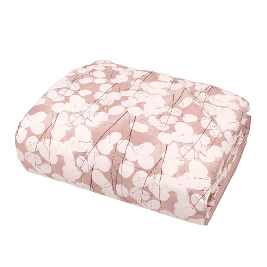 Trapunta primaverile matrimoniale Fazzini Lunaria, in percalle di puro cotone. Il trapuntino Lunaria presenta una fantasia floreale dallo stile moderno, con fiori chiari su fondo rosa. Quilt