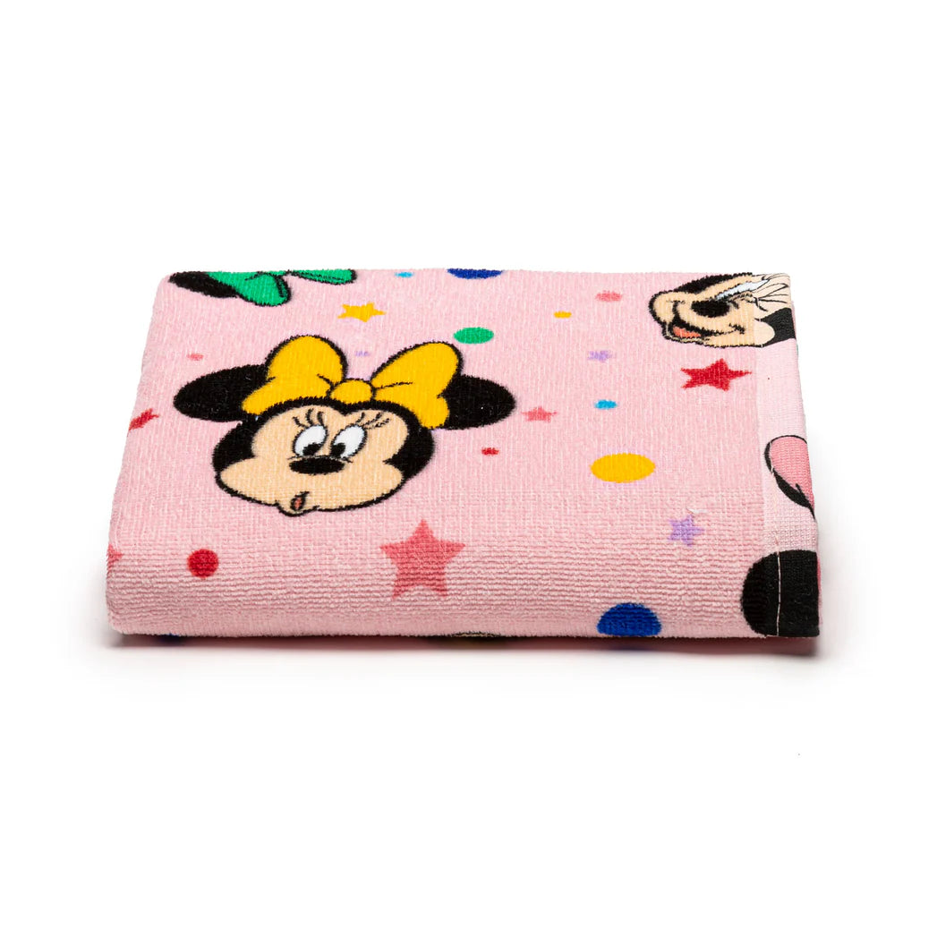 Asciugamano Minnie Fiocco di Caleffi Disney, in spugna di puro cotone. Fantasia con vari ritratti di Minnie su fondo rosa, con stelline colorate. Ideale per la tua bambina.
