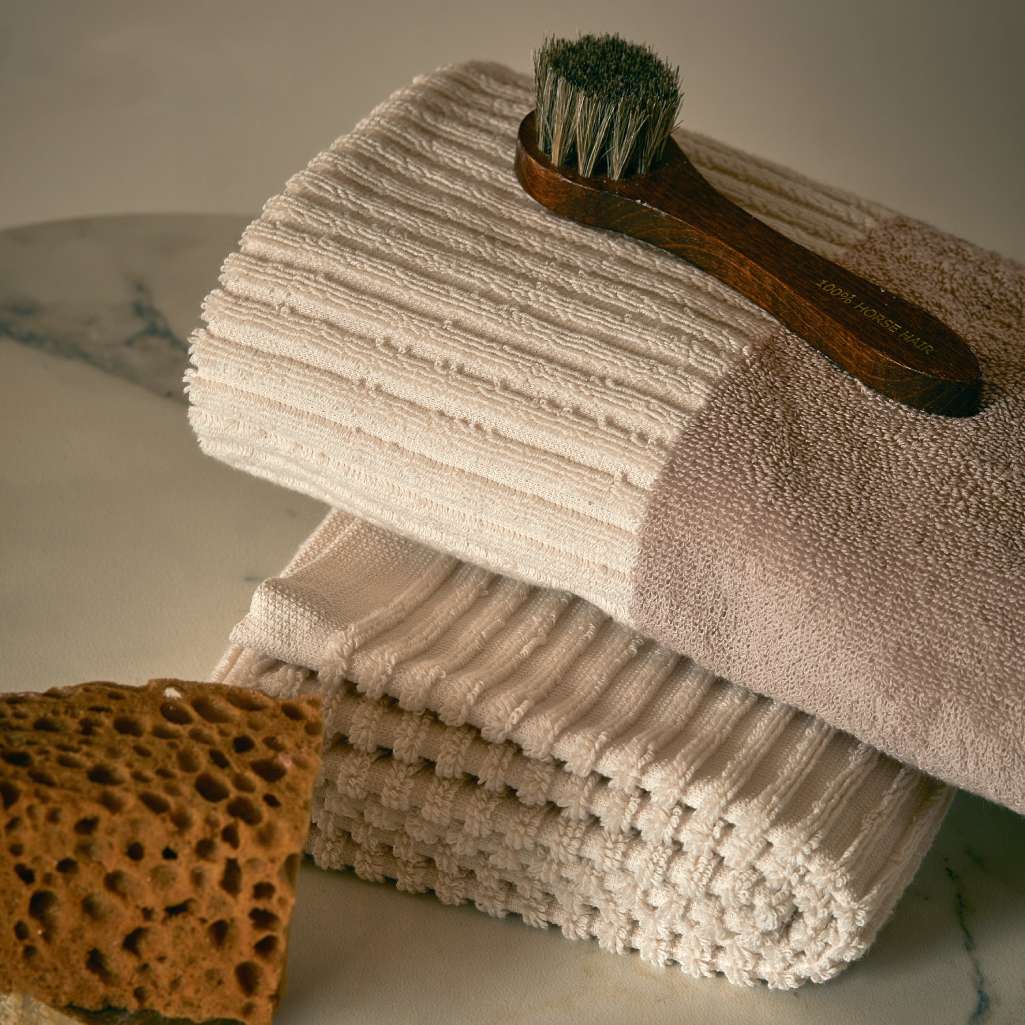 asciugamano viso con ospite fazzini dialogo. colore torrone panna beige