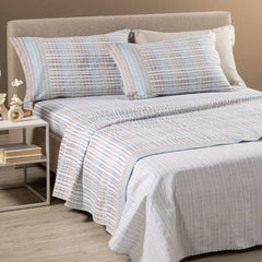 Completo lenzuola Caleffi Norvegia, in flanella di cotone. Fantasia geometrica che ricorda le trame dei tessuti nordici nei colori grigio, azzurro, tortora