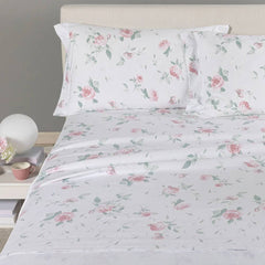 lenzuola Caleffi Rosa in flanella di cotone fantasia con fiori rosa su fondo bianco.