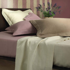 Completo lenzuola matrimoniale Le vie del Lino di NK Camillatex. Lenzuolo tinta unita in puro lino con orlo semplice. Colore avorio.