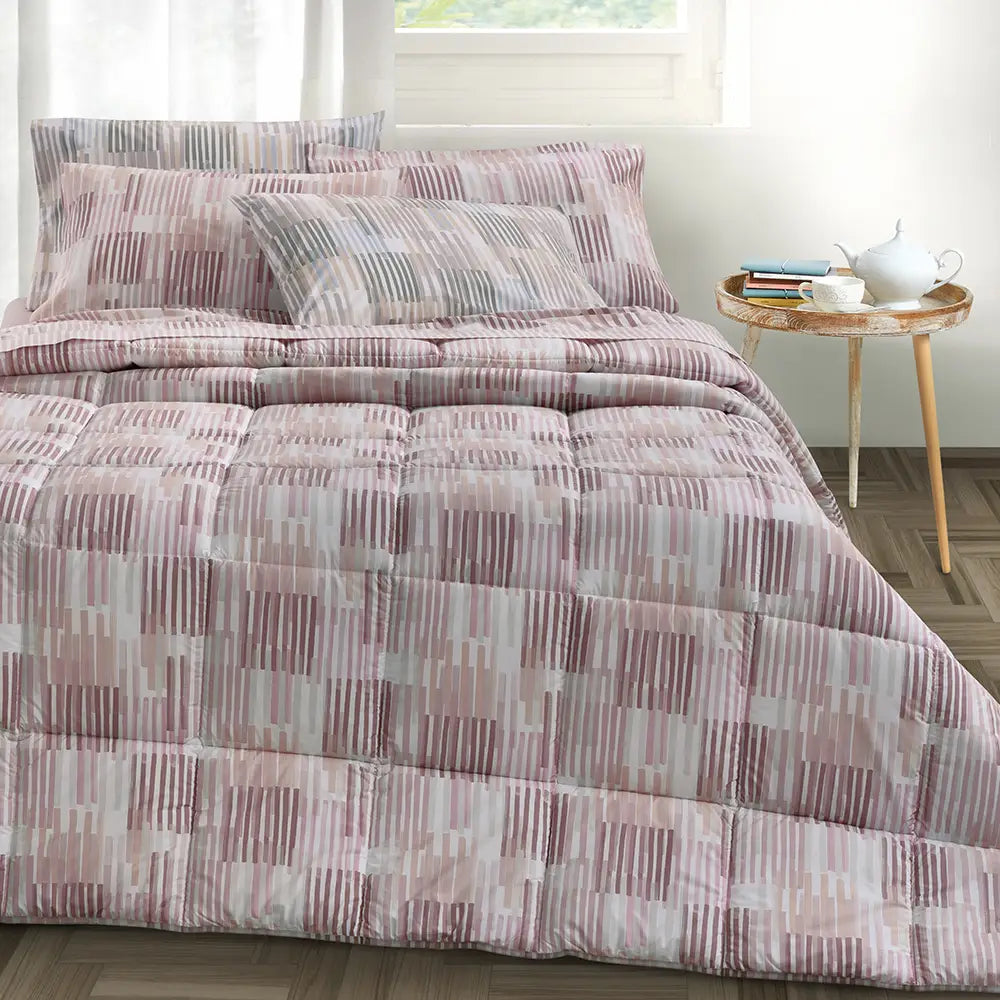 Completo lenzuola Somma Madeleine matrimoniale in flanella di cotone. Fantasia geometrica a righe rosa