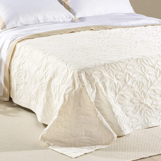 Copriletto estivo matera Caleffi in cotone. Fantasia jacquard con foglie avorio beige