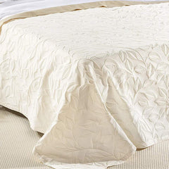 Coperta estiva matera Caleffi in cotone. Fantasia jacquard con foglie avorio beige