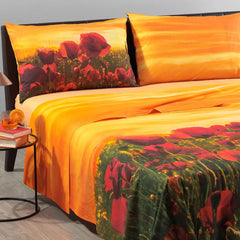 Lenzuola Copriletto matrimoniale in cotone Caleffi Papaveri. Completo lenzuola copriletto fantasia arancione con papaveri rossi e tramonto