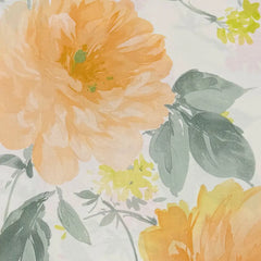 Lenzuolo copriletto matrimoniale Delice di Somma, in percalle di cotone. fantasia stile acquerello con grandi fiori arancio e gialli.