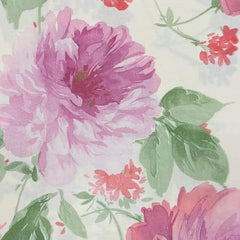 Lenzuolo copriletto matrimoniale Delice di Somma, in percalle di cotone. fantasia stile acquerello con grandi fiori rosa.