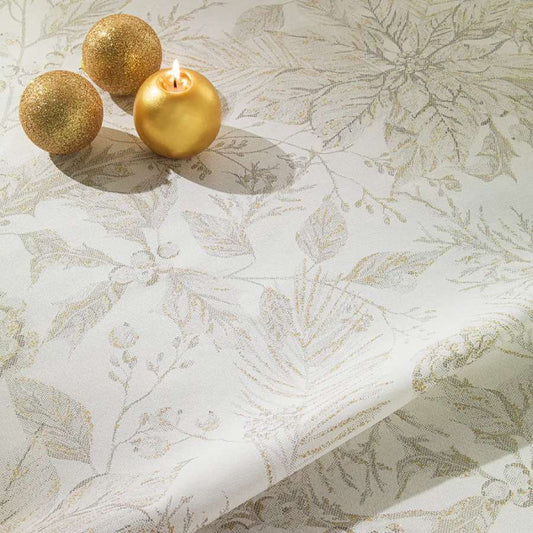 Tovaglia natalizia Lumiere di Gabel in cotone. Fantasia floreale beige tortora con effetto dorato su fondo avorio. misura rettangolare, quadrata o rotonda.