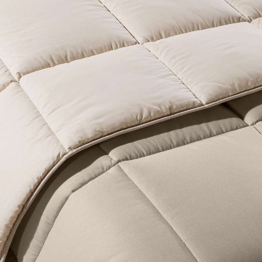 Trapunta invernale matrimoniale Bicolor di Caleffi, in puro cotone tinta unita doubleface. Piumone colore naturale tortora