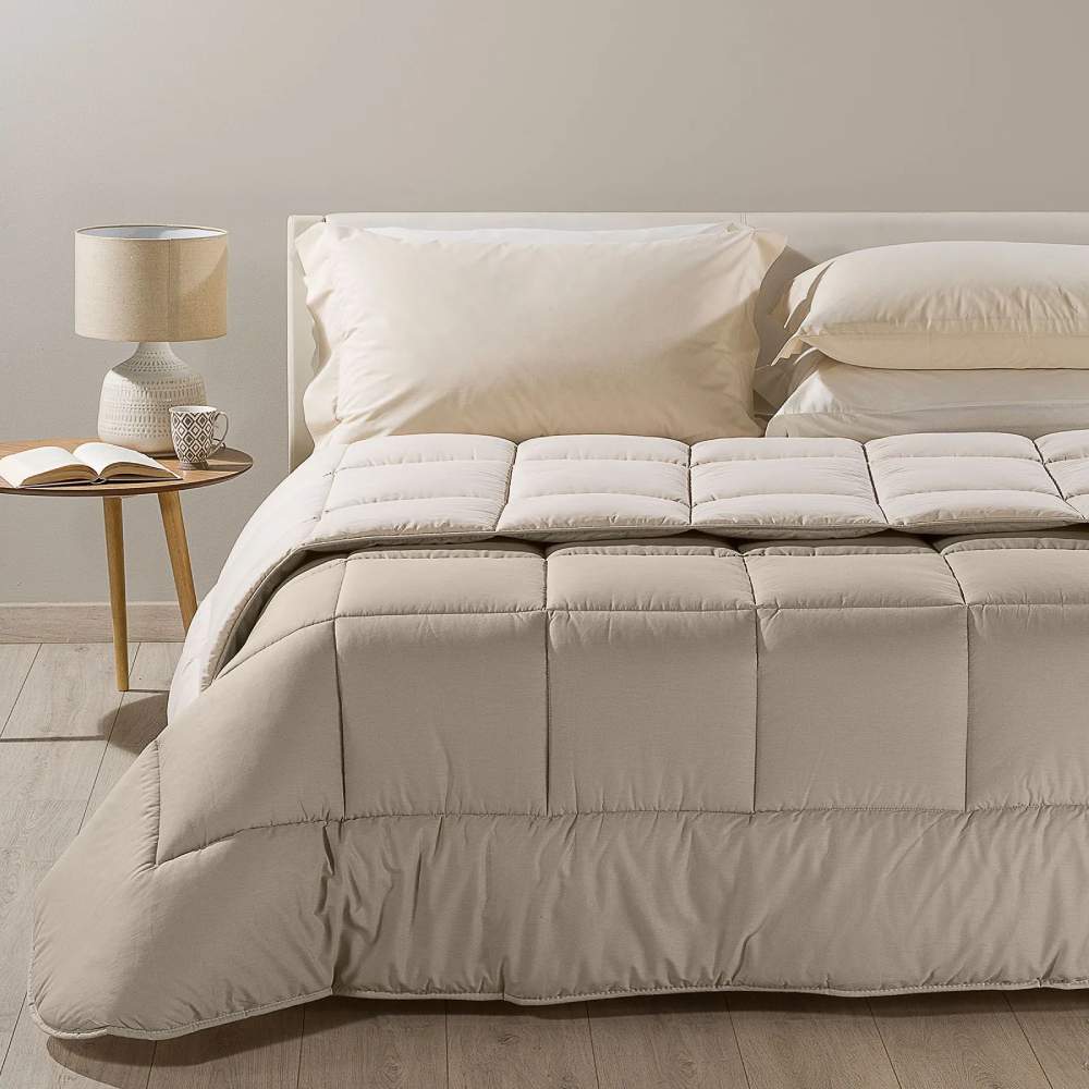 Trapunta invernale matrimoniale Bicolor di Caleffi, in puro cotone tinta unita doubleface. Piumone colore naturale tortora