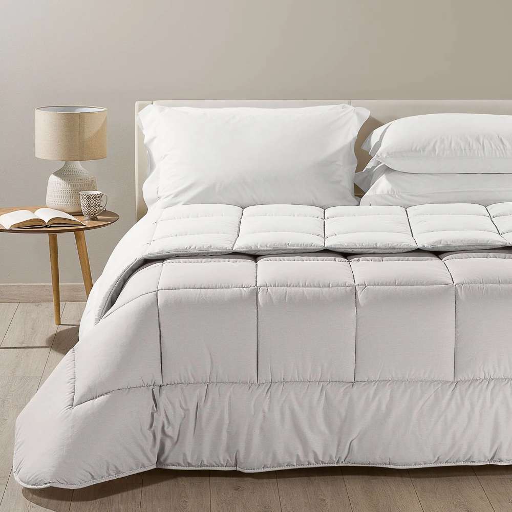 Trapunta invernale matrimoniale Bicolor di Caleffi, in puro cotone tinta unita double face. Piumone colore sabbia beige