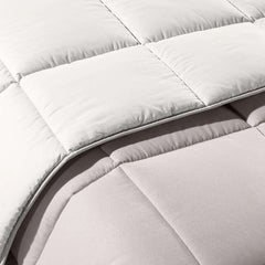 Trapunta invernale matrimoniale Bicolor di Caleffi, in puro cotone tinta unita doubleface. Piumone colore sabbia beige