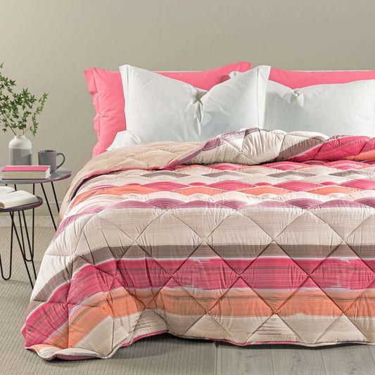 Trapunta invernale Caleffi Atlanta in microfibra. Disponibile nella misura per letto singolo, e piazza e mezza.Piumone con fantasia moderna con striature rosa corallo e arancioni