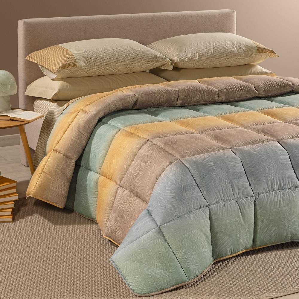 Trapunta invernale Atlantis Caleffi. Piumone fantasia geometrica variante ambra. Per letto singolo, piazza e mezza e matrimoniale.