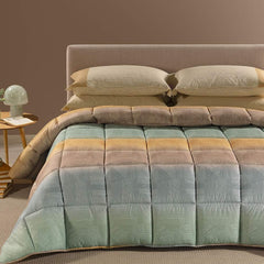 Trapunta invernale Atlantis Caleffi. Piumone fantasia geometrica variante ambra