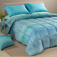 Trapunta invernale Atlantis Caleffi. Piumone fantasia geometrica variante azzurro avio