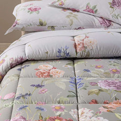 Trapunta invernale matrimoniale Caleffi Giardino Romantico in cotone.
Piumone fantasia con fiori colorati su fondo tortora.