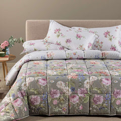 Trapunta invernale matrimoniale Caleffi Giardino Romantico in cotone.
Piumone fantasia con fiori colorati su fondo tortora.
