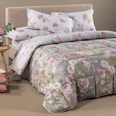 Trapunta invernale matrimoniale Caleffi Giardino Romantico in cotone.
Piumone fantasia con fiori colorati su fondo tortora.