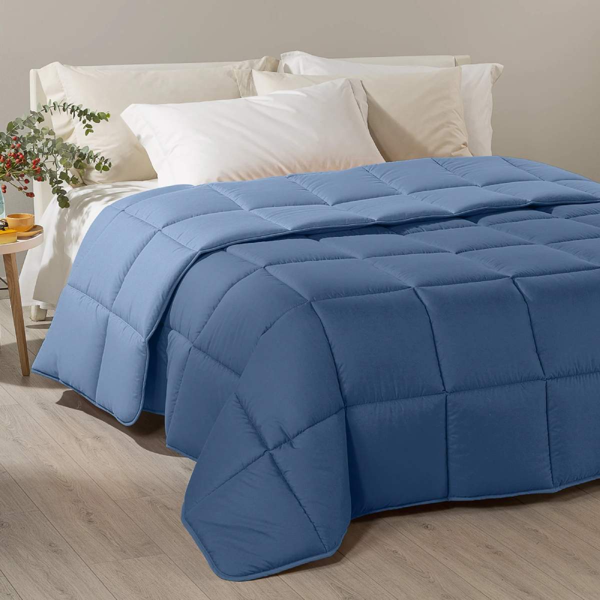 Trapunta invernale Caleffi Tinta Unita Double in microfibra. Piumone double face colore avio