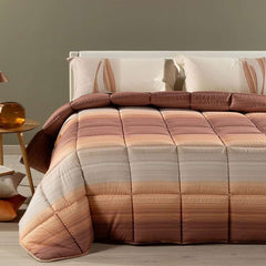 Trapunta invernale Caleffi Rainbow in microfibra. Disponibile nella misura per letto singolo. Fantasia moderna a righe con effetto degradè colore ambra beige marrone