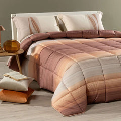 Trapunta invernale Caleffi Rainbow in microfibra. Disponibile nella misura per letto singolo. Fantasia moderna a righe con effetto degradè colore ambra beige marrone