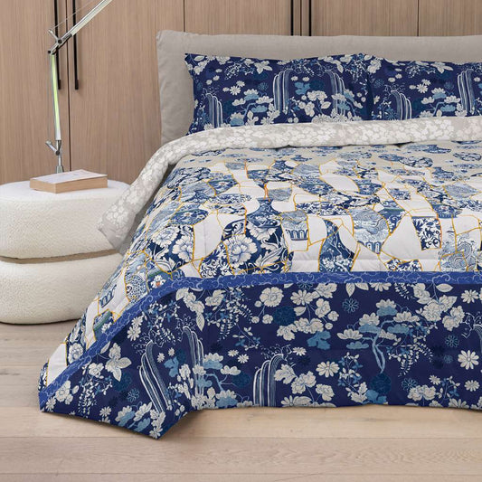trapunta invernale kintsugi fazzini fantasia moderna bianca e blu con dettagli oro