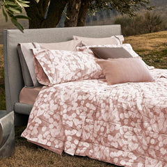 Trapunta Invernale matrimoniale Fazzini Lunaria in percalle di cotone. fantasia moderna con fiori chiari su fondo rosa