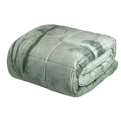 Trapunta invernale matrimoniale Fazzini Nemora, in raso di cotone. Piumone in fantasia verde con natura e alberi stile acquerello.