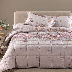 Trapunta invernale caleffi matrimoniale ikebana in cotone fantasia con fascia di fiori su fondo beige