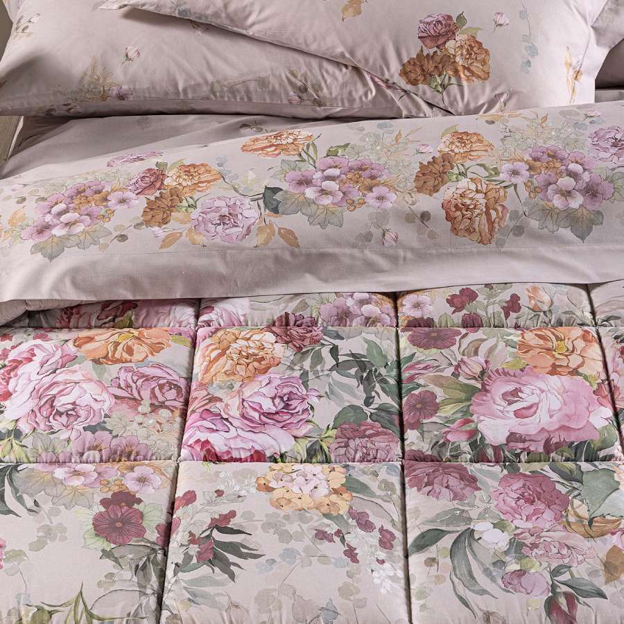 trapunta invernale caleffi matrimoniale ikebana piumone in cotone fantasia con fascia di fiori su fondo beige