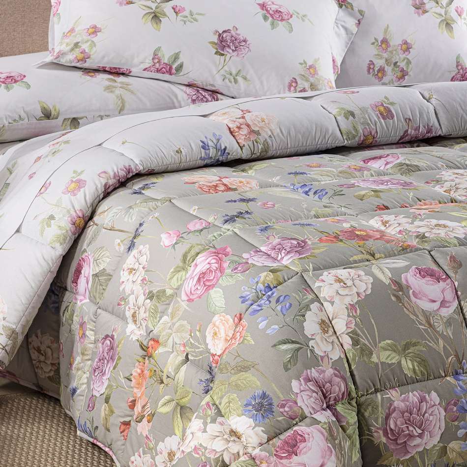 Trapunta invernale matrimoniale Caleffi Giardino Romantico in cotone.
Piumone fantasia con fiori colorati su fondo tortora.