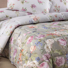 Trapunta invernale matrimoniale Caleffi Giardino Romantico in cotone.
Piumone fantasia con fiori colorati su fondo tortora.