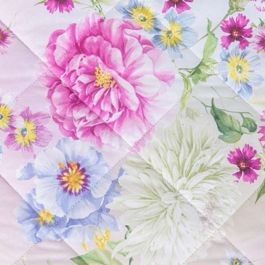 Trapuntino Garden Caleffi. Fantasia vivace con fiori rosa e gialli su fondo chiaro. dettaglio fiori