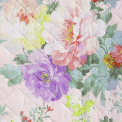 Trapuntino matrimoniale Caleffi Giardino, in puro cotone con stampa digitale. La trapunta primaverile Giardino presenta una vivace fantasia floreale, con fiori di vari colori su fondo chiaro. Dettaglio fantasia.