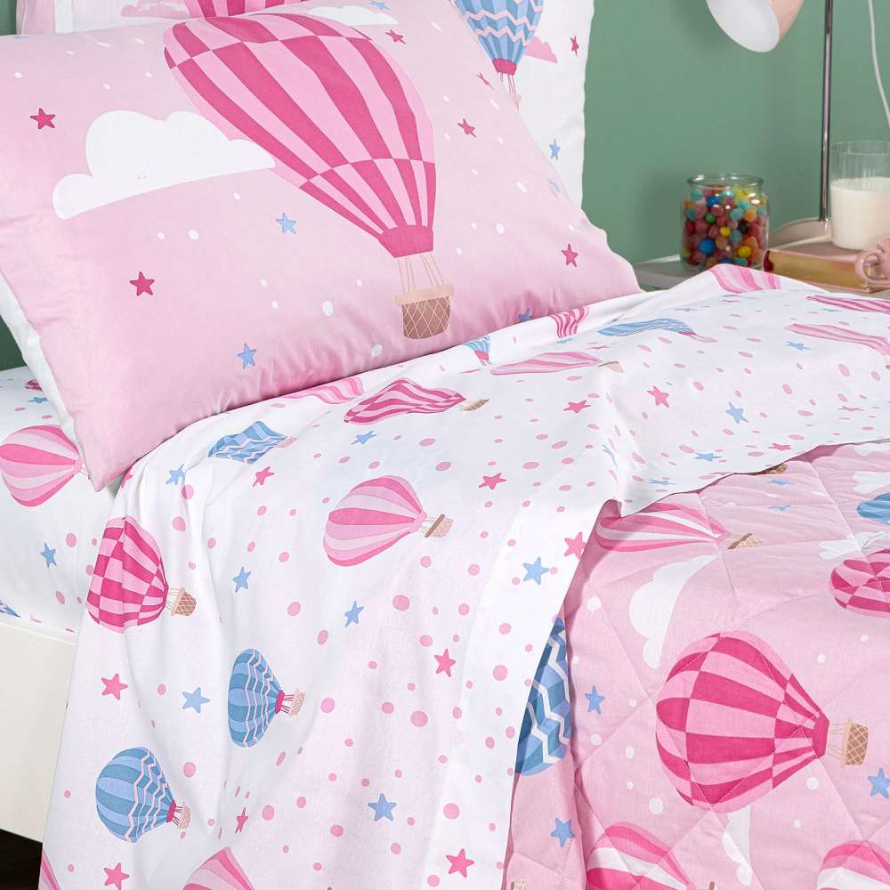 Trapuntino Caleffi Star in puro cotone per letto singolo. La trapunta primaverile Star presenta una fantasia con mongolfiere rosa e azzurre su fondo rosa. Fantasia ideale per bambine e ragazze