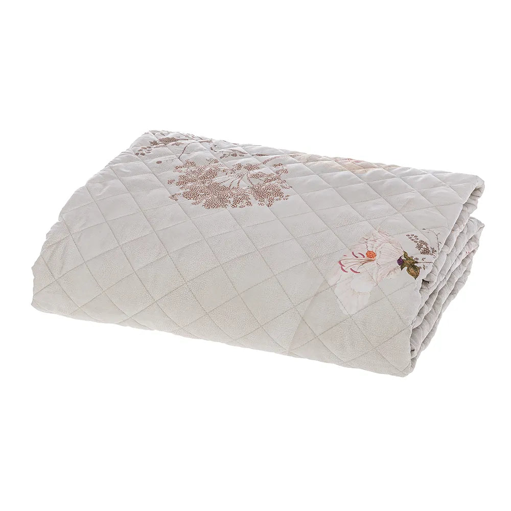 Trapuntino matrimoniale Crystal Borbonese, in raso di puro cotone stampato. Variante pesca. La trapunta primaverile Crystal è caratterizzata da una fantasia floreale dai toni delicati, con fiori color pesca e fondo beige con la tipica stampa Borbonese a occhio di pernice. Trapunta rifinita a mano con angoli stondati.