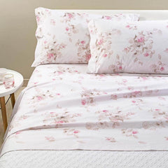 Completo lenzuola matrimoniale Caleffi Floreale in percalle di puro cotone. Fantasia floreale con fiori rosa su fondo chiaro.