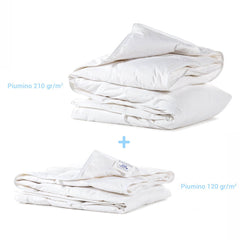 Piumino interno Quattrostagioni Caleffi in piuma d'oca. peso 120 + 210 g/mq. Totale 330 g/mq. Composizione 50% piumino, 50% piumette. Rivestimento in cotone a tenuta piuma. Misura letto singolo e matrimoniale.