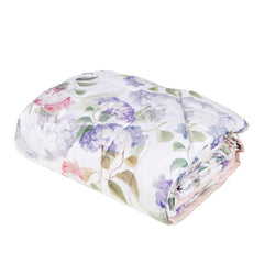 Trapunta invernale piumone matrimoniale Ortensie Fazzini in percalle di puro cotone. Fantasia floreale con fiori rosa e glicine. Collezione autunno inverno 2021.