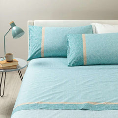 Completo lenzuola matrimoniale Caleffi Cool in puro cotone. Fantasia geometrica e dallo stile moderno con trama stile Borbonese. Colore anice azzurro.