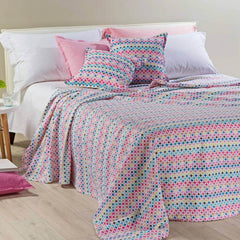 Coperta estiva matrimoniale Roxi di Caleffi, in piquet di puro cotone. Coperta leggera con fantasia geometrica multicolore.