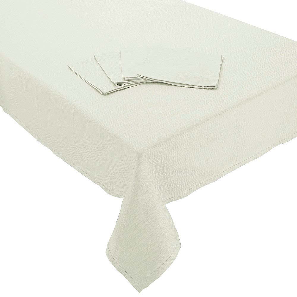 Servizio tavola Tea della linea Jacquard di Somma. Raffinatissima tovaglia rettangolare per 12 persone con 12 tovaglioli. Tinta unita, 100% cotone. colore avana, panna